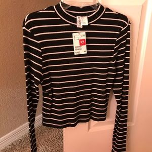 Striped black and white turtle neck top